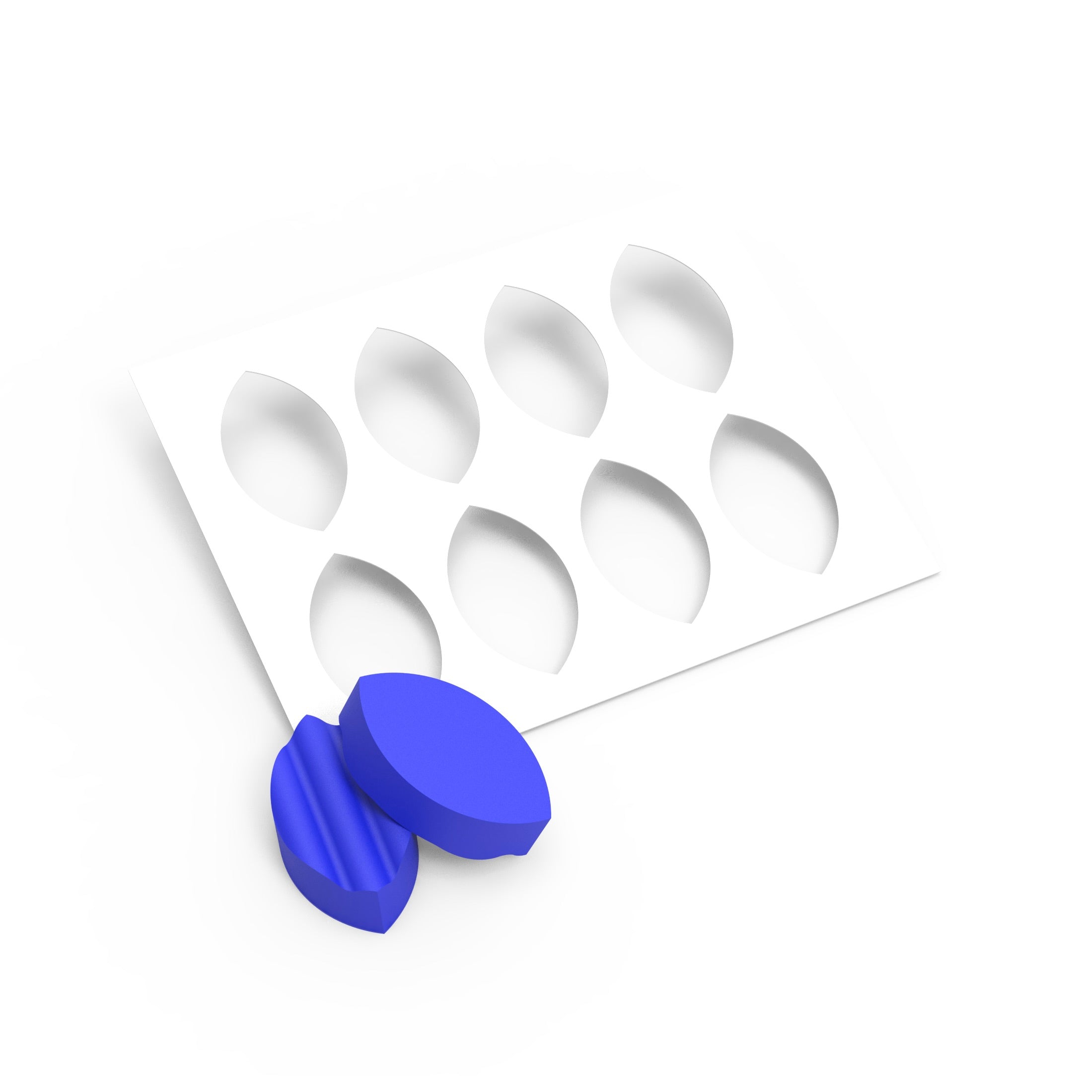 Blue wavy calisson silicone molds with a white 8-cavity stencil sheet.