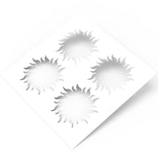 White square pastry stencil featuring four detailed sun-shaped cutouts with wavy rays.