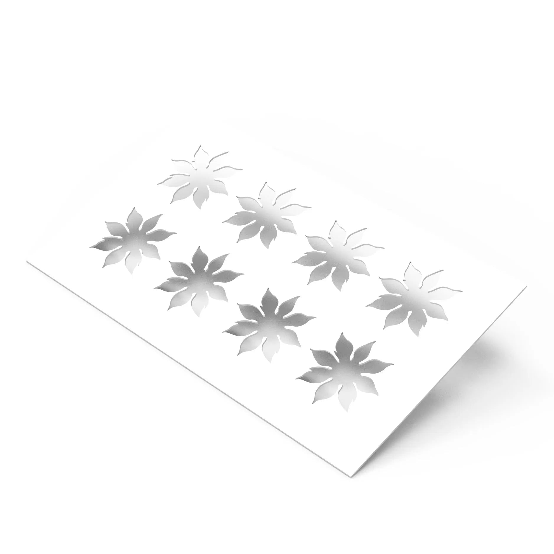 White strawberry calyx pastry stencil with eight leaf-shaped cutouts for dessert decorating.