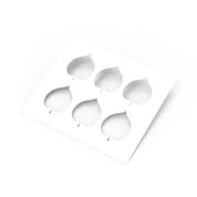 White Linden leaf stencil with six heart-shaped botanical cutouts for pastry design.