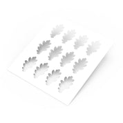 White plastic pastry stencil featuring twelve detailed oak leaf cutouts.