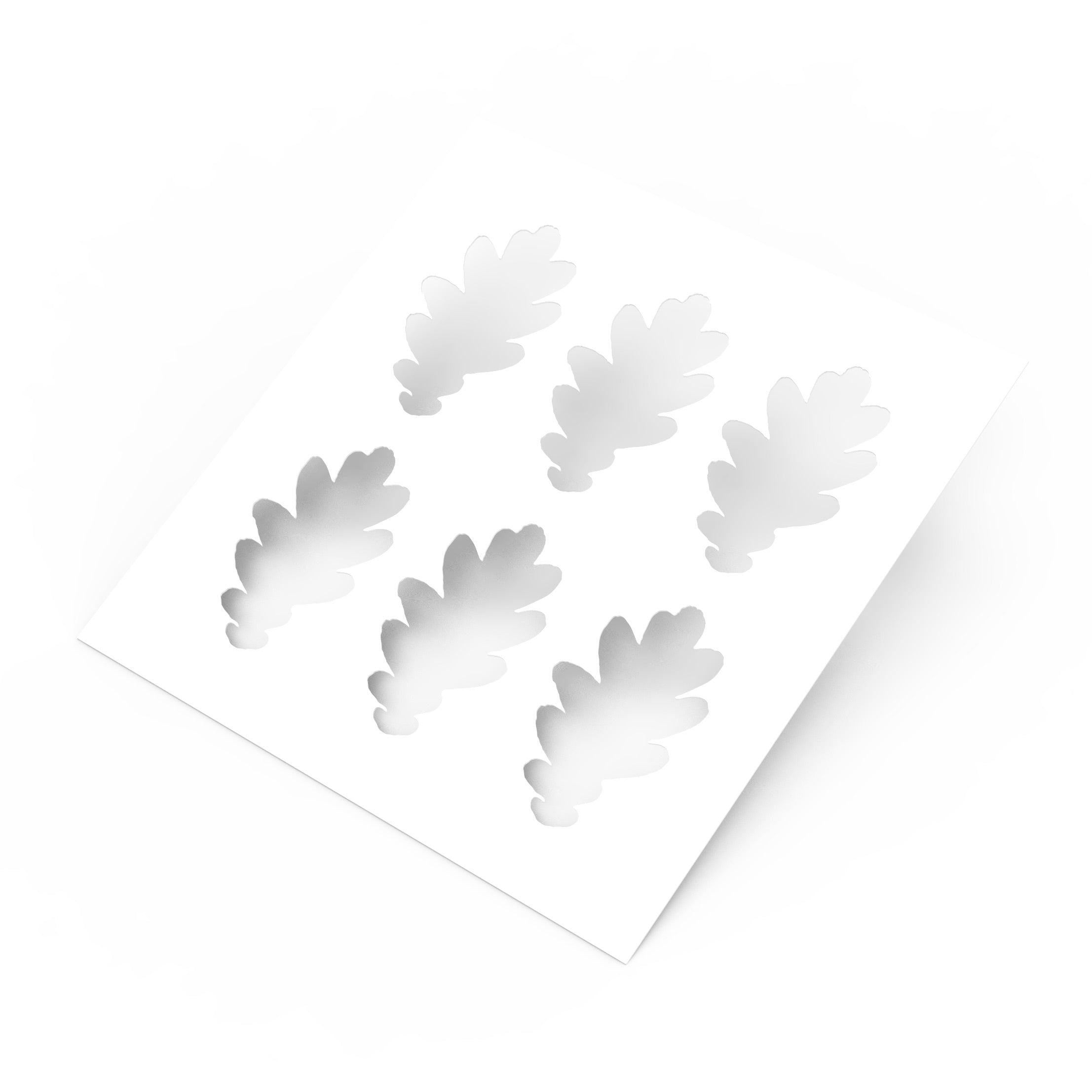 White square pastry stencil featuring six detailed oak leaf cutouts.