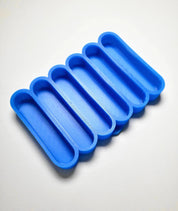 Blue silicone mold with six long, rounded finger-shaped cavities for pastry making.