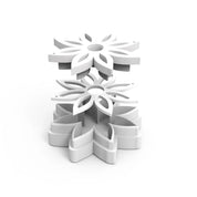 White star anise flower cookie cutter with nested botanical mold shapes.