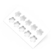 White plastic pastry stencil with ten five-petal strawberry flower cutouts.