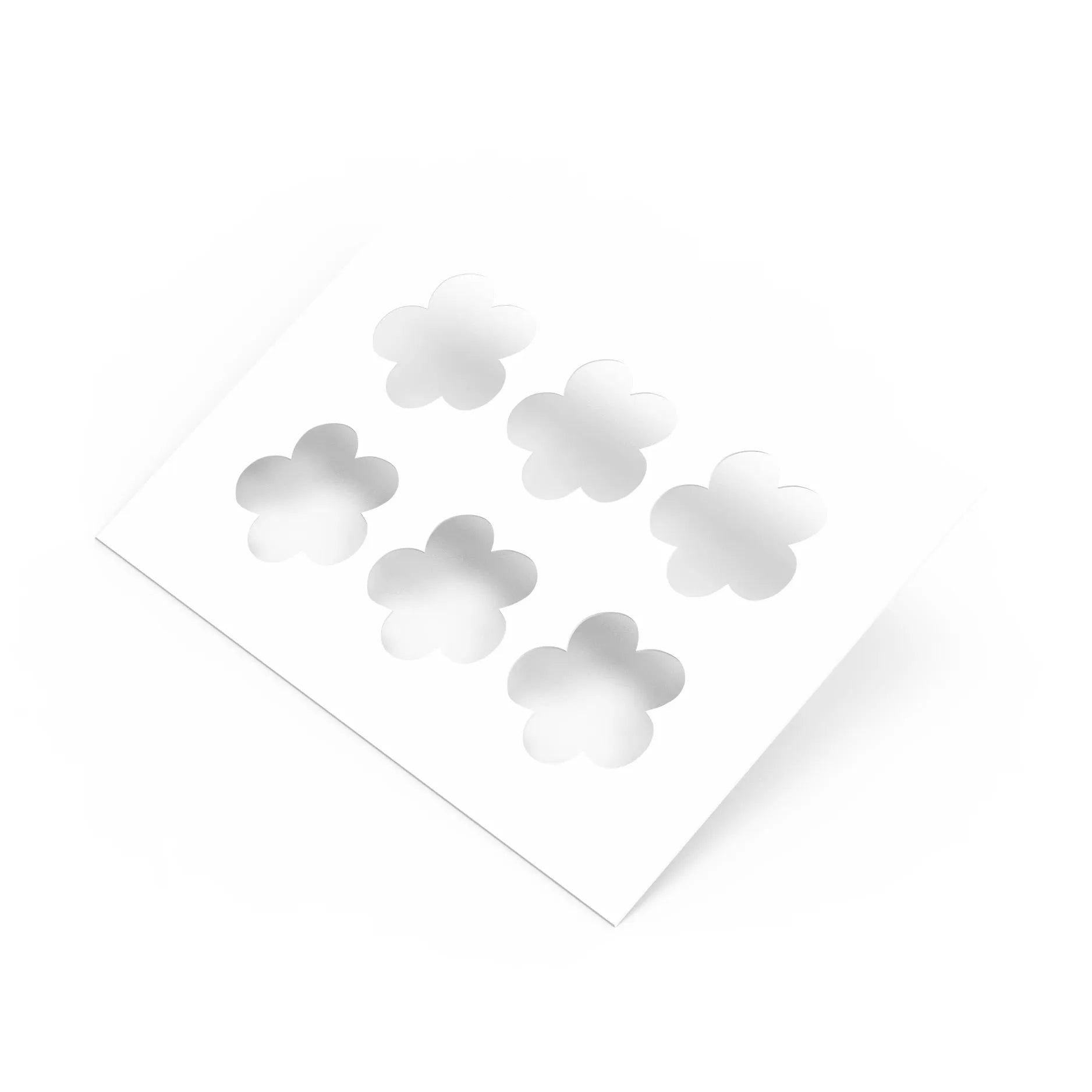 White strawberry flower pastry stencil with six five-petal floral cutouts.