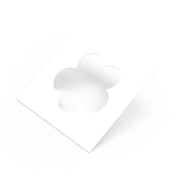 White square pastry stencil with a five-petal strawberry flower cutout.
