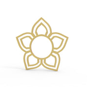 Gold five-petal flower-shaped silicone tuile mold on a white background.