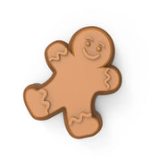 Brown gingerbread boy silicone pastry mold with detailed smiling face and wavy icing designs.