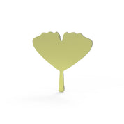 Yellow ginkgo leaf shaped silicone tuile mold on a white background.