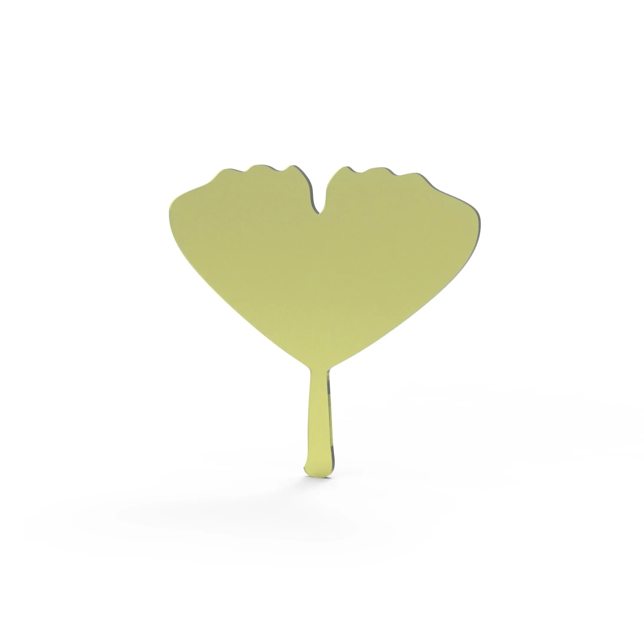 Yellow ginkgo leaf shaped silicone tuile mold on a white background.
