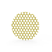 Yellow circular silicone tuile mat with a precise hexagonal honeycomb pattern.