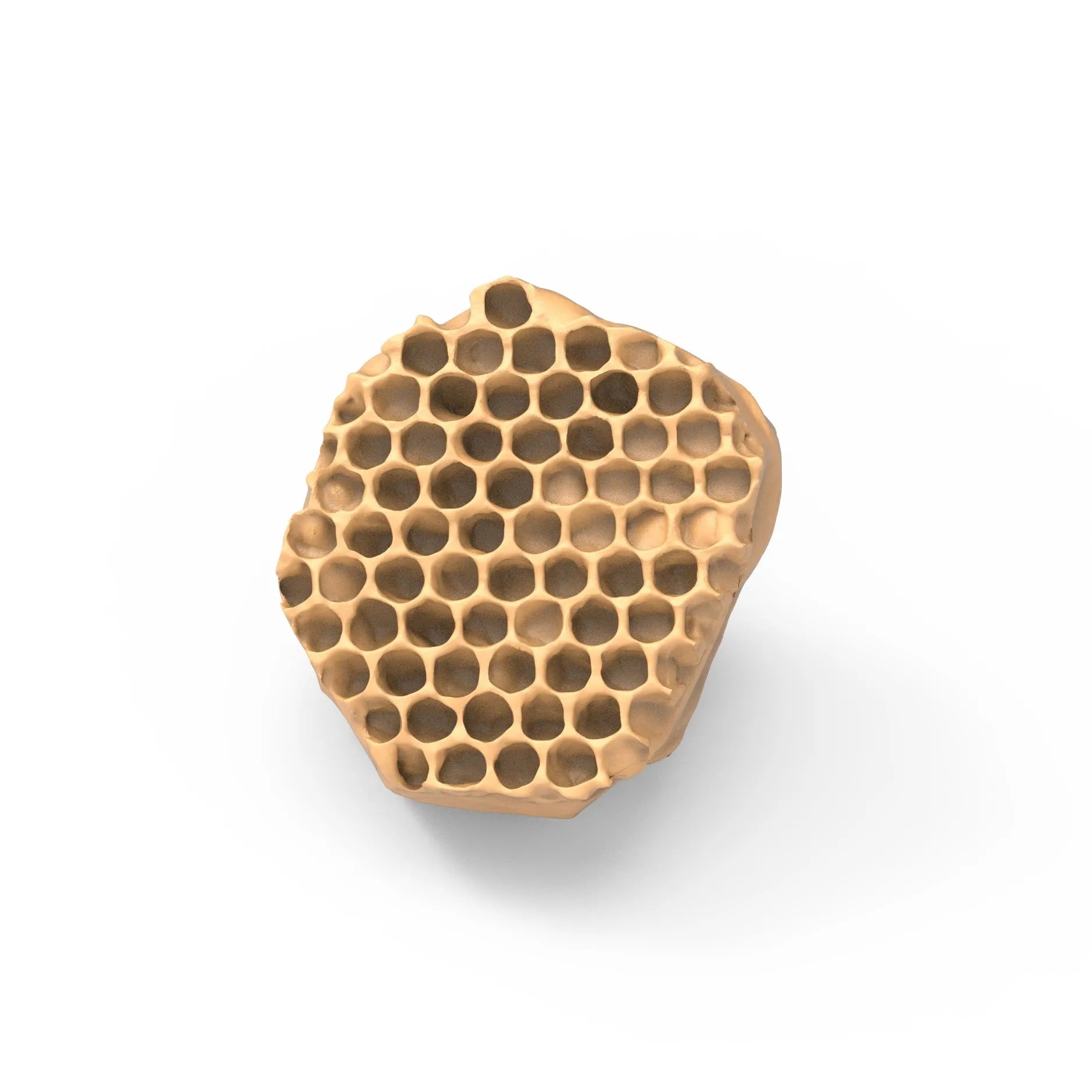 Beige silicone mold in the shape of an irregular, realistic honeycomb fragment.