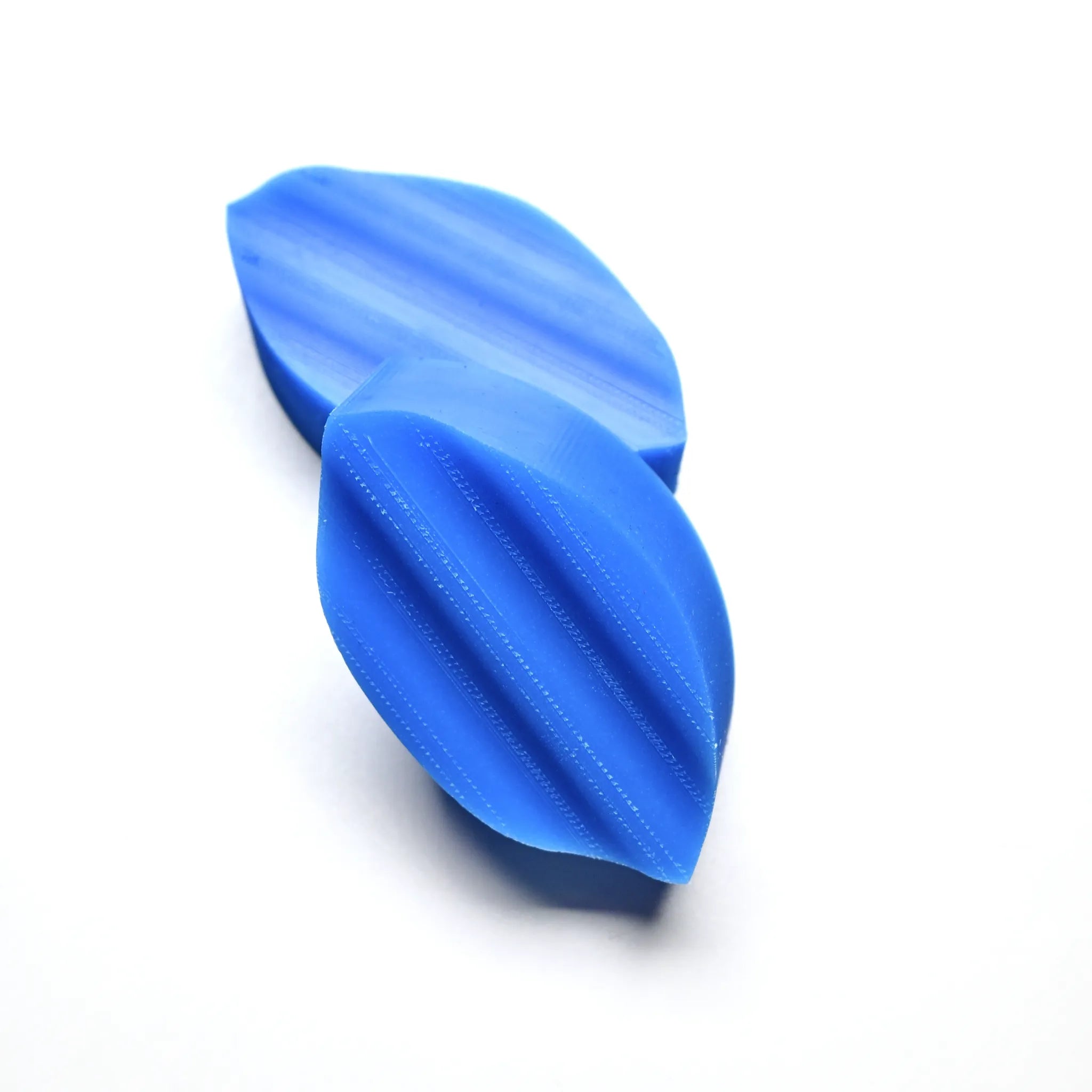 Blue silicone Wavy Calisson pastry press with textured, leaf-shaped molds.
