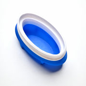 Blue and white oval-shaped silicone ellipse pastry mold on a white background.