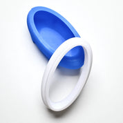 Blue silicone ellipse mold with a matching white plastic cutting ring.