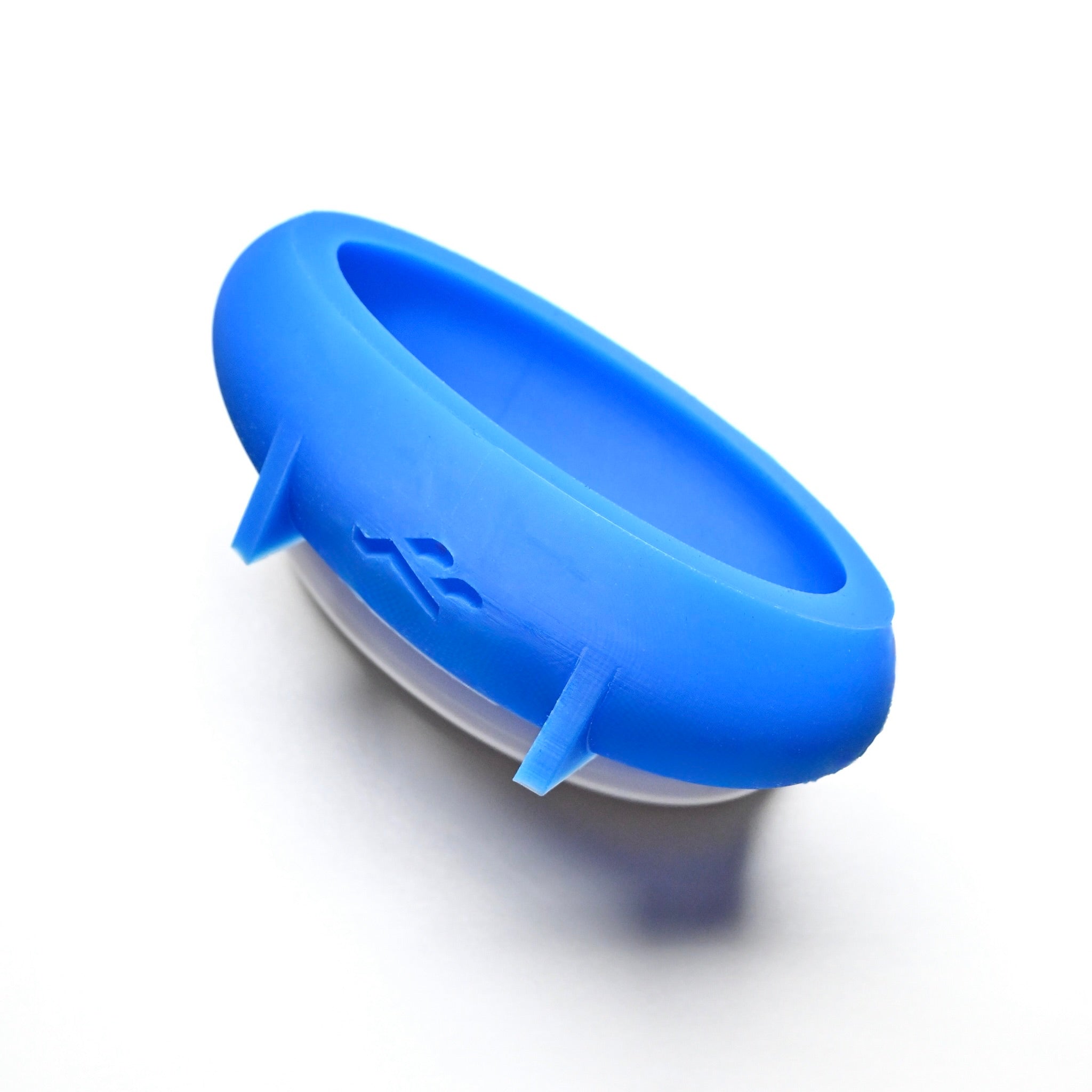 Blue silicone ellipse pastry mold with a smooth, rounded oval shape on a white background.