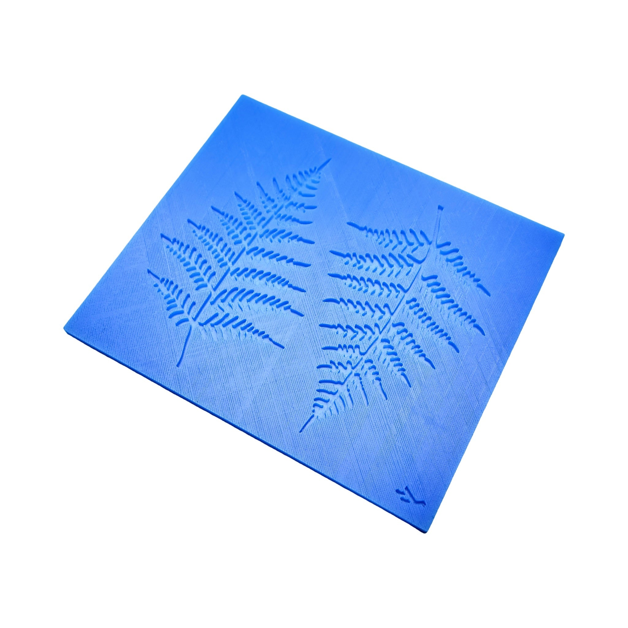 Blue silicone fern tuile mat featuring two detailed leaf-shaped molds.