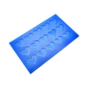Blue silicone mat with fifteen small heart-shaped tuile molds.