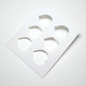 White plastic Linden Leaf stencil featuring six heart-shaped botanical leaf cutouts for pastry design.