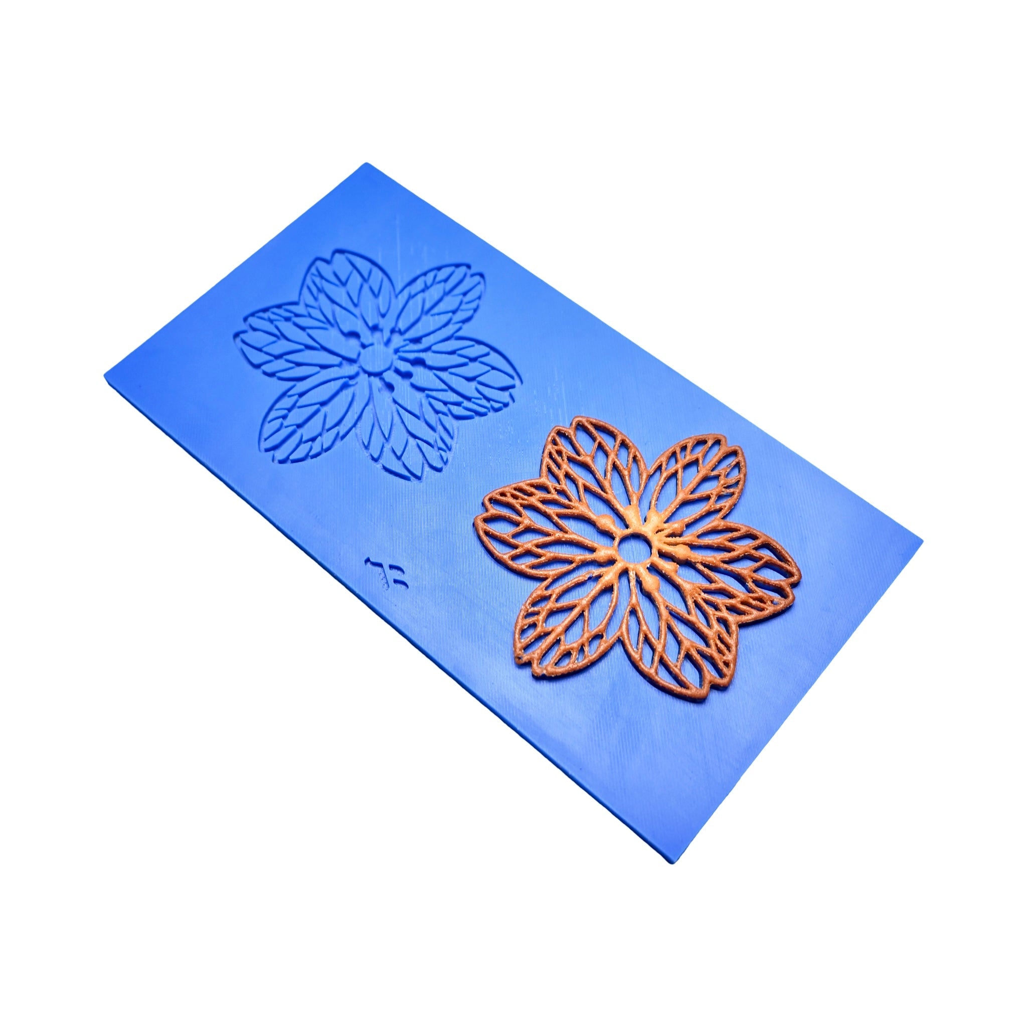 Blue Hanami silicone tuile mat with intricate six-petal flower mold shapes.