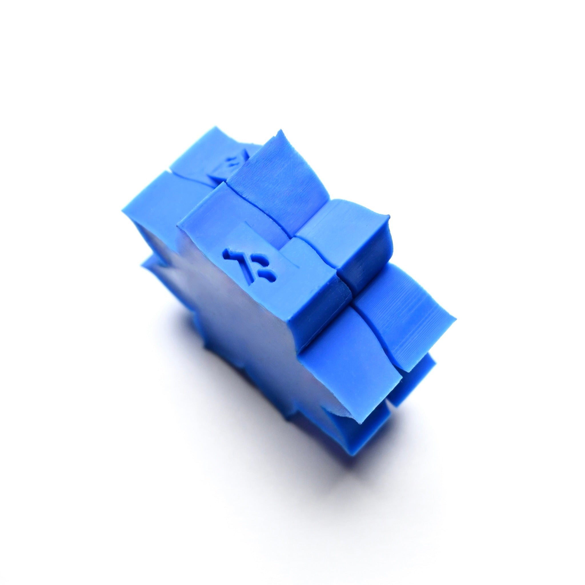 Blue silicone Lotus Press mold with a star-shaped, multi-layered botanical design.