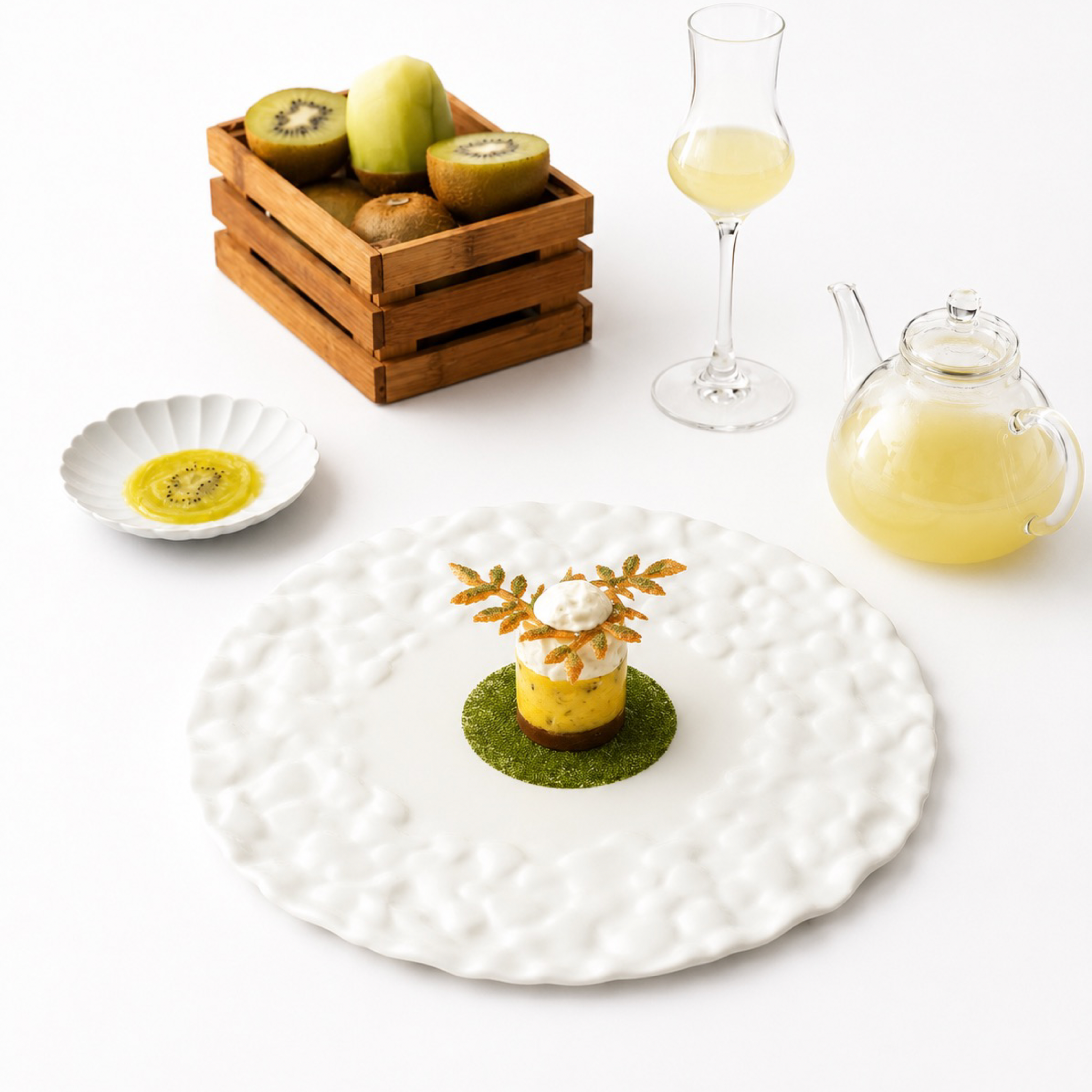 Plated dessert topped with leaf-shaped Tagelia tuiles made from a silicone mold.