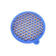 Blue silicone round mat with a hexagonal honeycomb-shaped tuile mold.