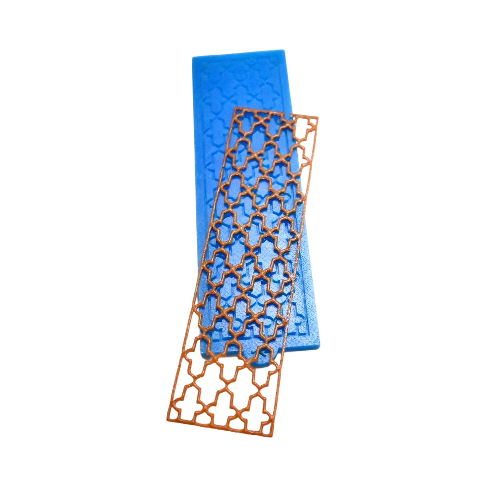 Blue silicone Baroque tuile mold with a matching brown lace pastry crisp.