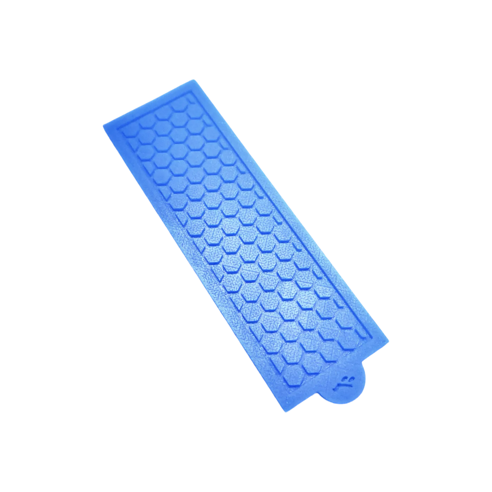 Blue silicone tuile mat featuring a detailed hexagonal honeycomb mold pattern.