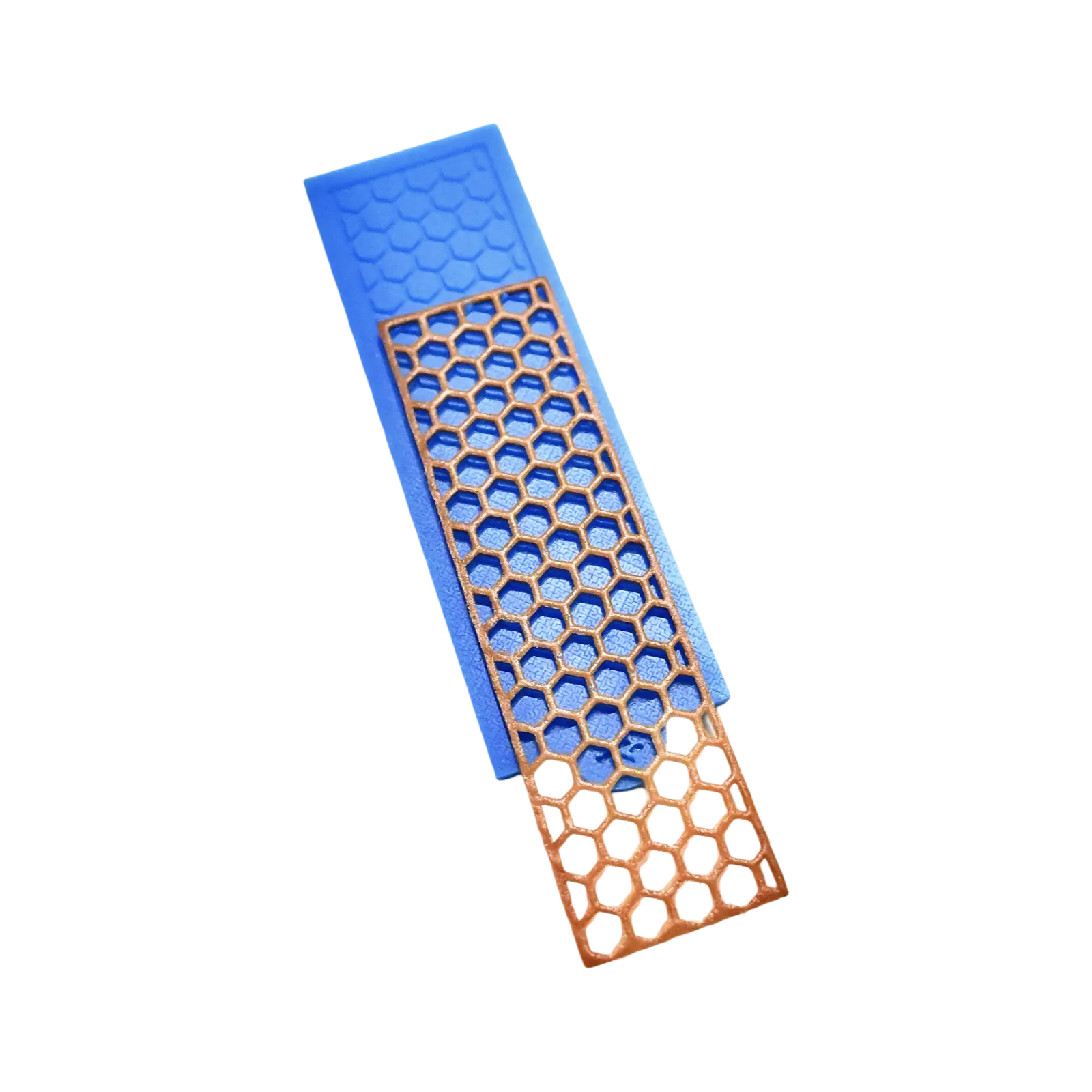 Blue silicone tuile mat with a golden hexagonal honeycomb pattern mold.