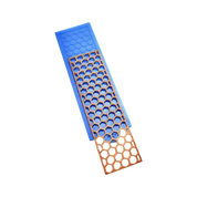 Blue silicone tuile mat with a golden hexagonal honeycomb pattern mold.