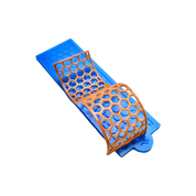 Blue silicone tuile mat with a curved, golden-brown honeycomb-shaped edible decoration.
