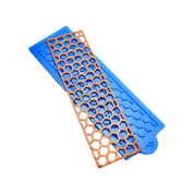 Blue silicone tuile mat with a golden hexagonal honeycomb pattern mold.