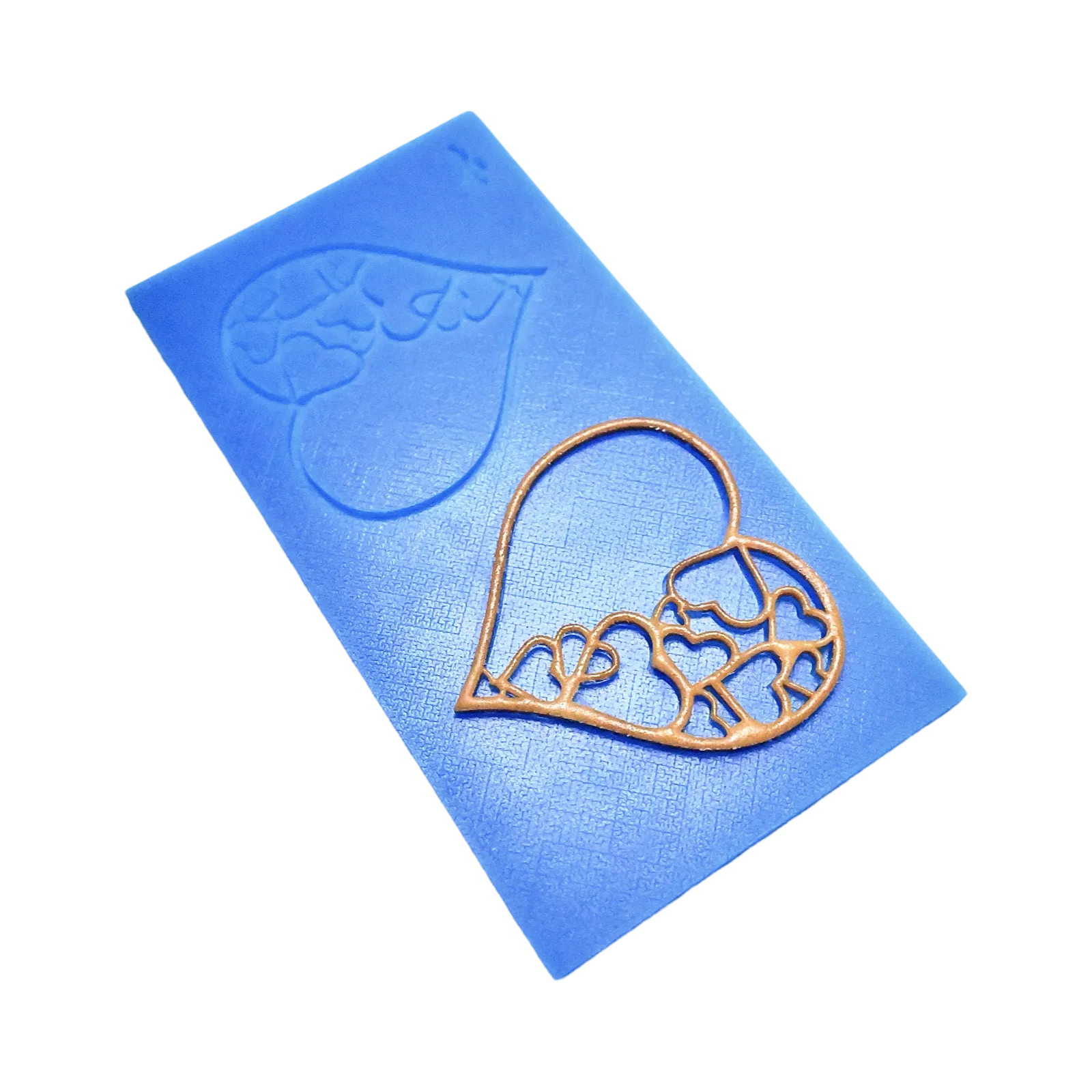 Blue silicone tuile mat with intricate heart-shaped molds and a golden pastry tuile.