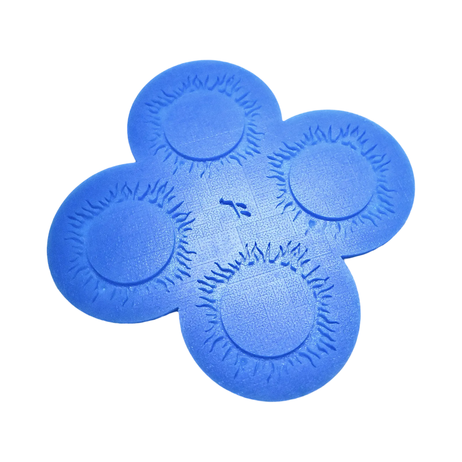 Blue silicone tuile mat with four circular molds featuring spiral, sunburst-like textured edges.