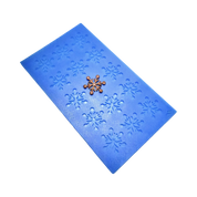 Blue silicone snowflake tuile mat with intricate snowflake-shaped molds.