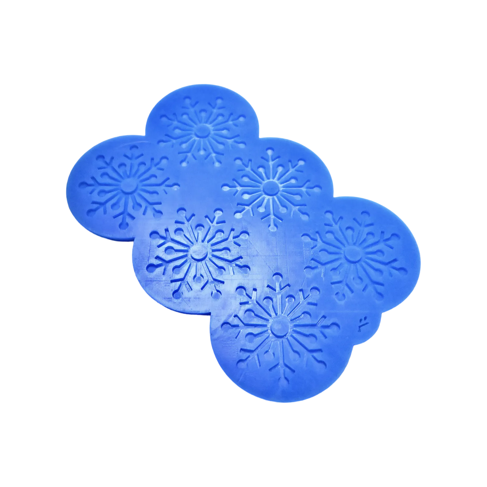 Blue silicone mat with six intricate snowflake-shaped tuile molds.