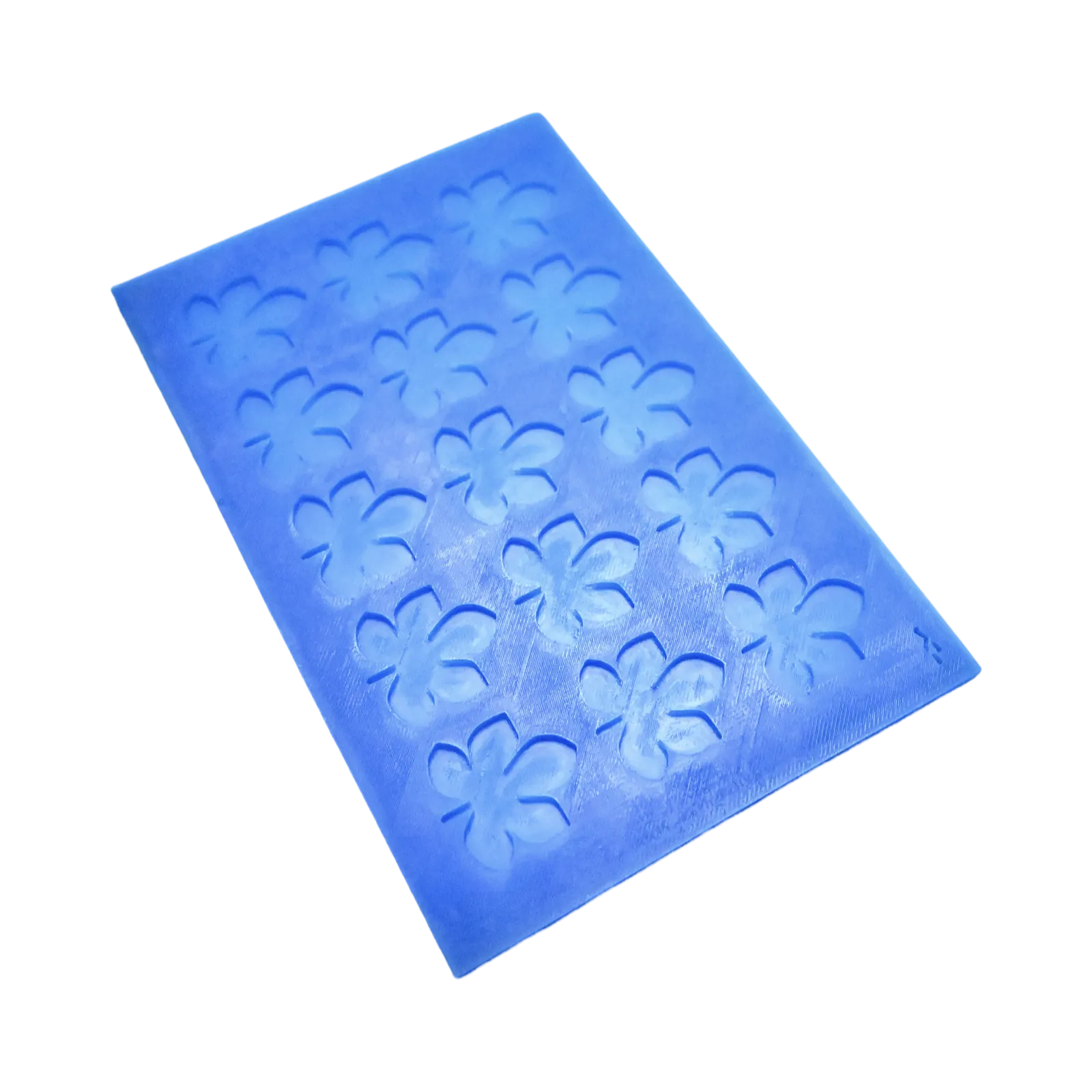 Blue silicone baking mat with multiple horse chestnut leaf shaped cavities.