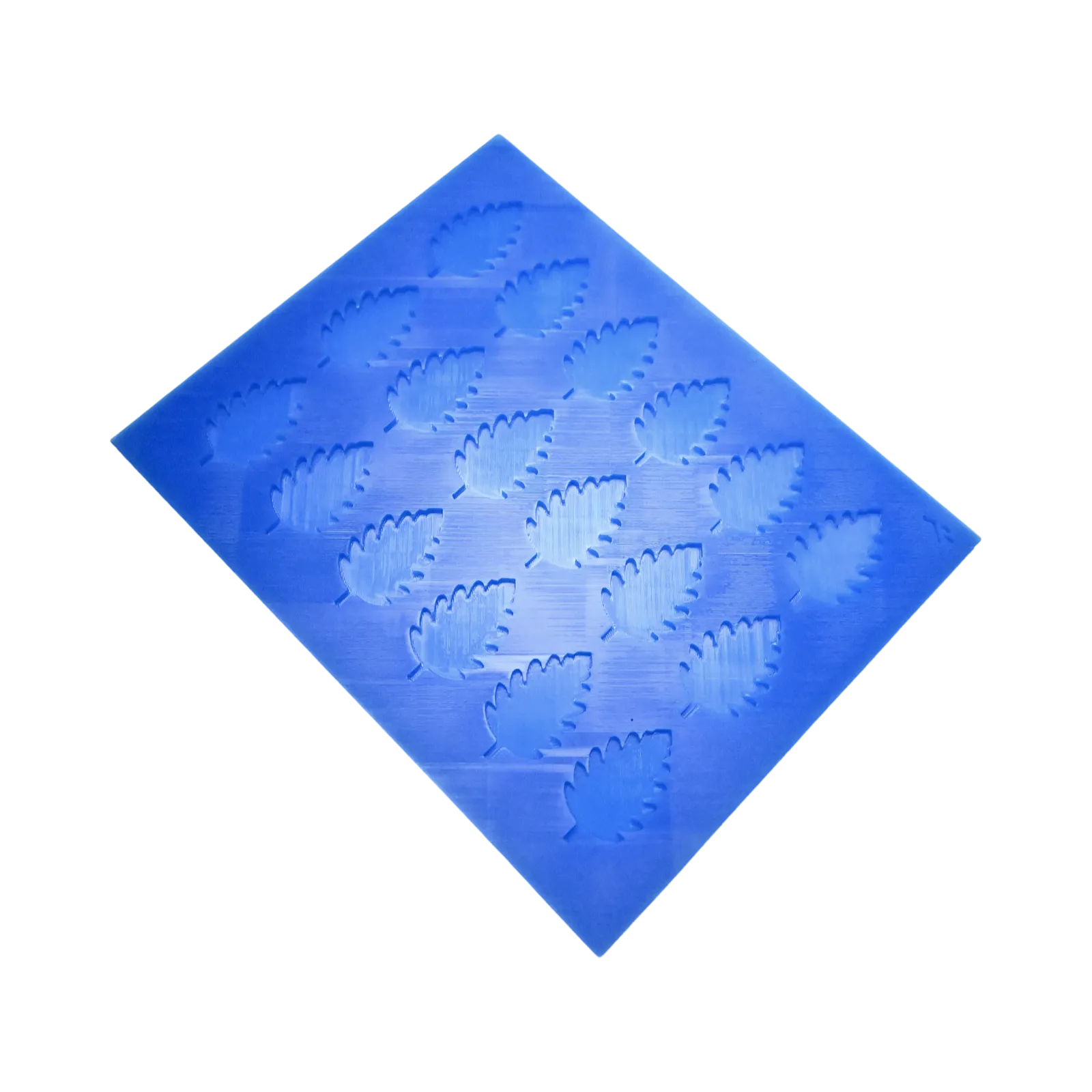 Blue silicone mat with multiple birch leaf tuile molds.