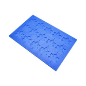 Blue silicone tuile mat with detailed vine leaf shaped molds.