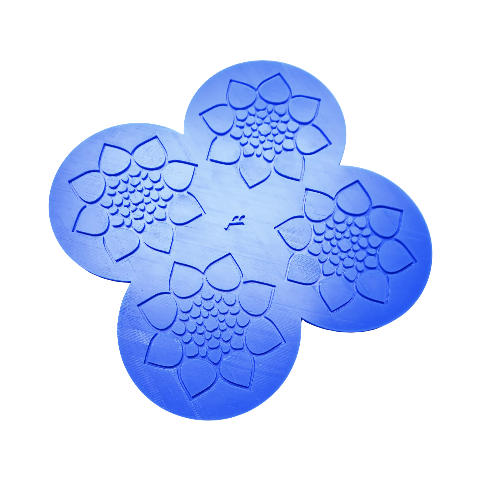 Blue silicone tuile mat with four detailed calyx flower-shaped molds.