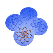 Blue silicone CALYX tuile mat with four detailed botanical flower-shaped molds.