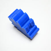 Blue silicone oak leaf press mold with a thick, lobed leaf shape and textured details on a white background.