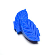 Blue silicone coffee leaf press molds with detailed vein textures on a white background.