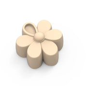 Beige silicone daisy-shaped pastry mold with six rounded petals and a central dome.