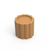 Brown silicone mini Charlotte mold with fluted sides and a circular top cavity.