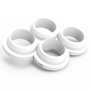 White plastic multi-cookie cutter with four connected circular molds.