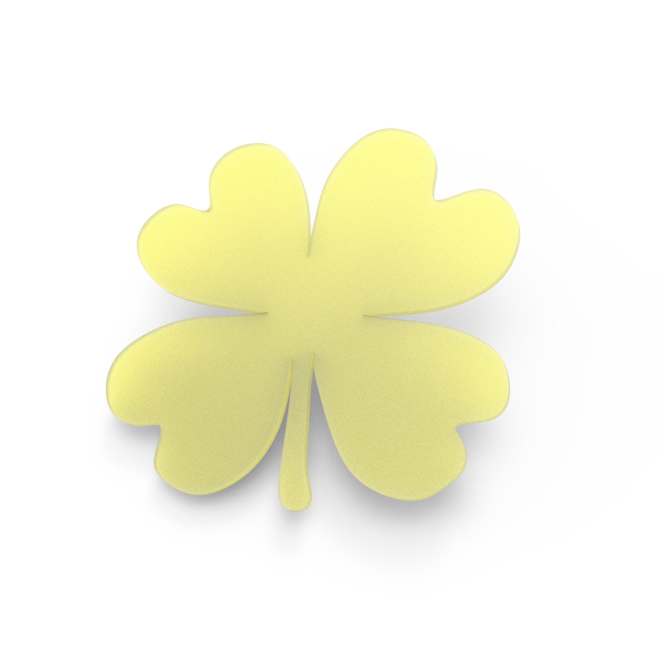 Yellow oxalis four-leaf clover shaped silicone tuile mold on a white background.